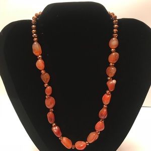 Earth-toned beaded necklace.